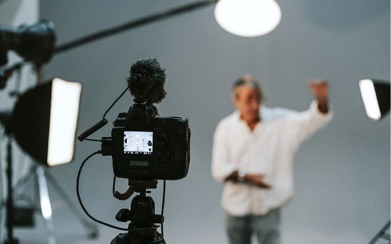 man learning lines in front of camera