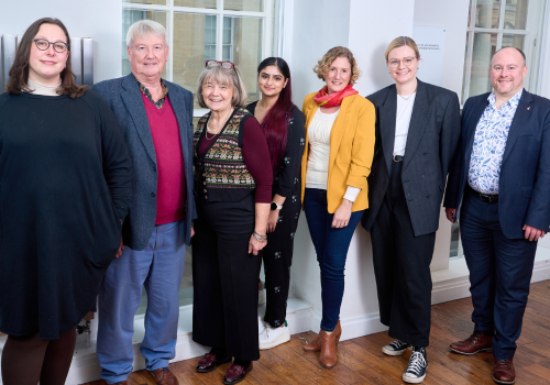 From left to right: Micaela Tuckwell, Vice Chair Joe Pilman, Chair Debbie Dance, Dr Jaskiran Kaur Bhogal, Deborah Richards, Ellie Claughton, and Adam Knight.