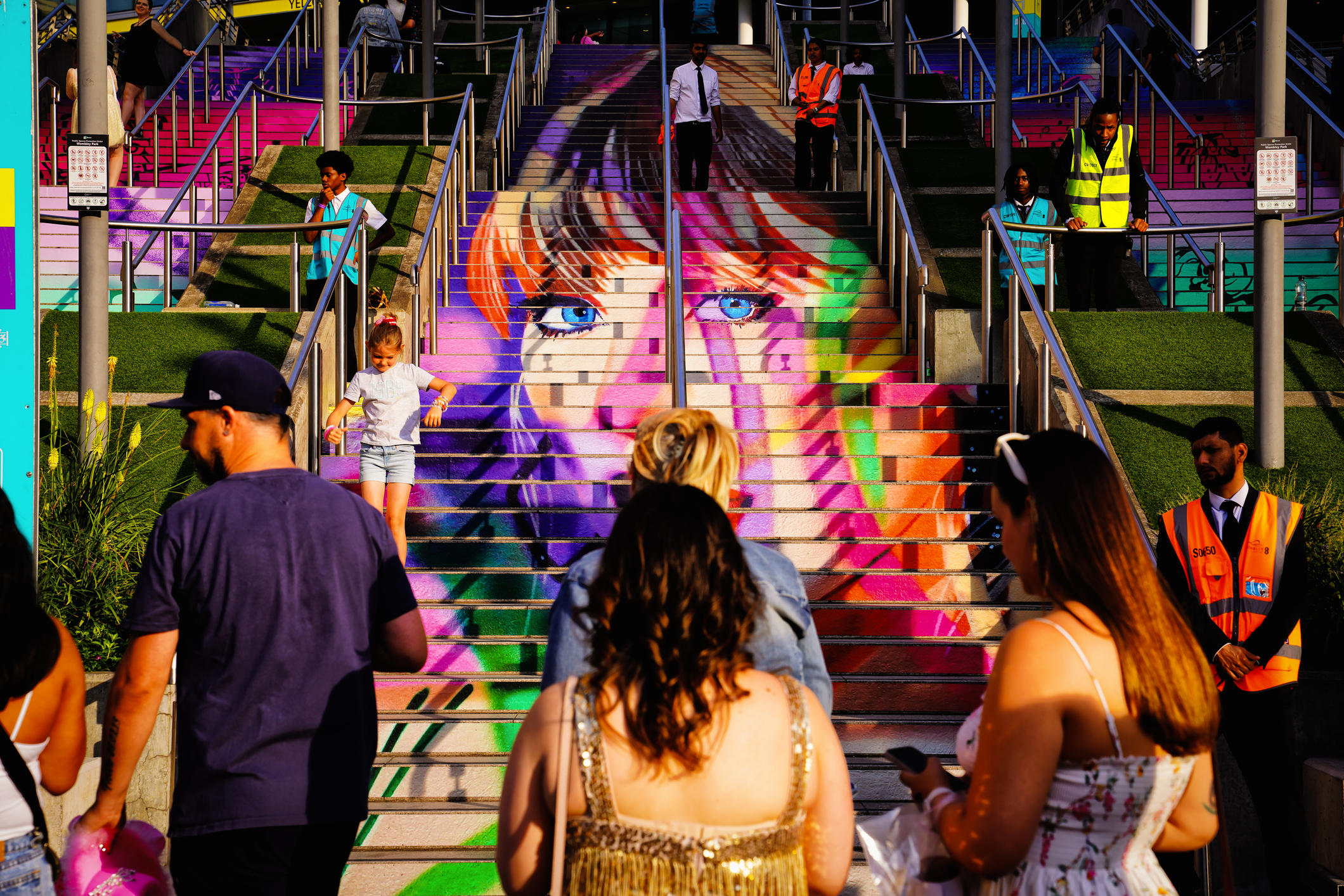 Daytime Wembley Park Boulevard street view, Taylor Swift's Eras Tour In England: a popular photo spot for Taylor Swift fans on the Spanish Steps At Wembley Stadium